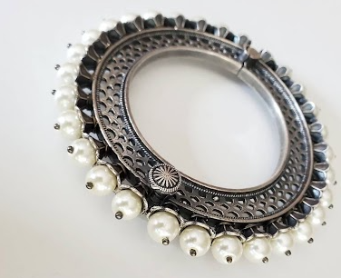 Silver lookalike statement bangle