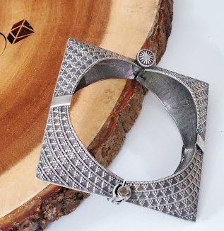 Silver lookalike statement bangle