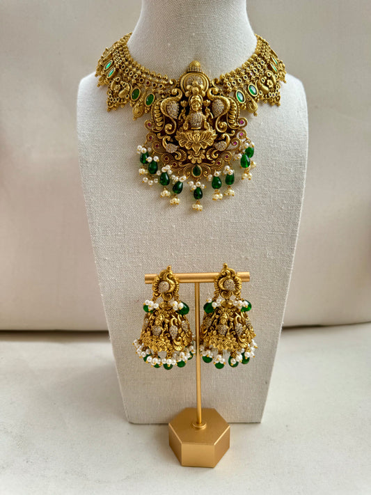 Statement temple necklace set with oversized jumka in green accent