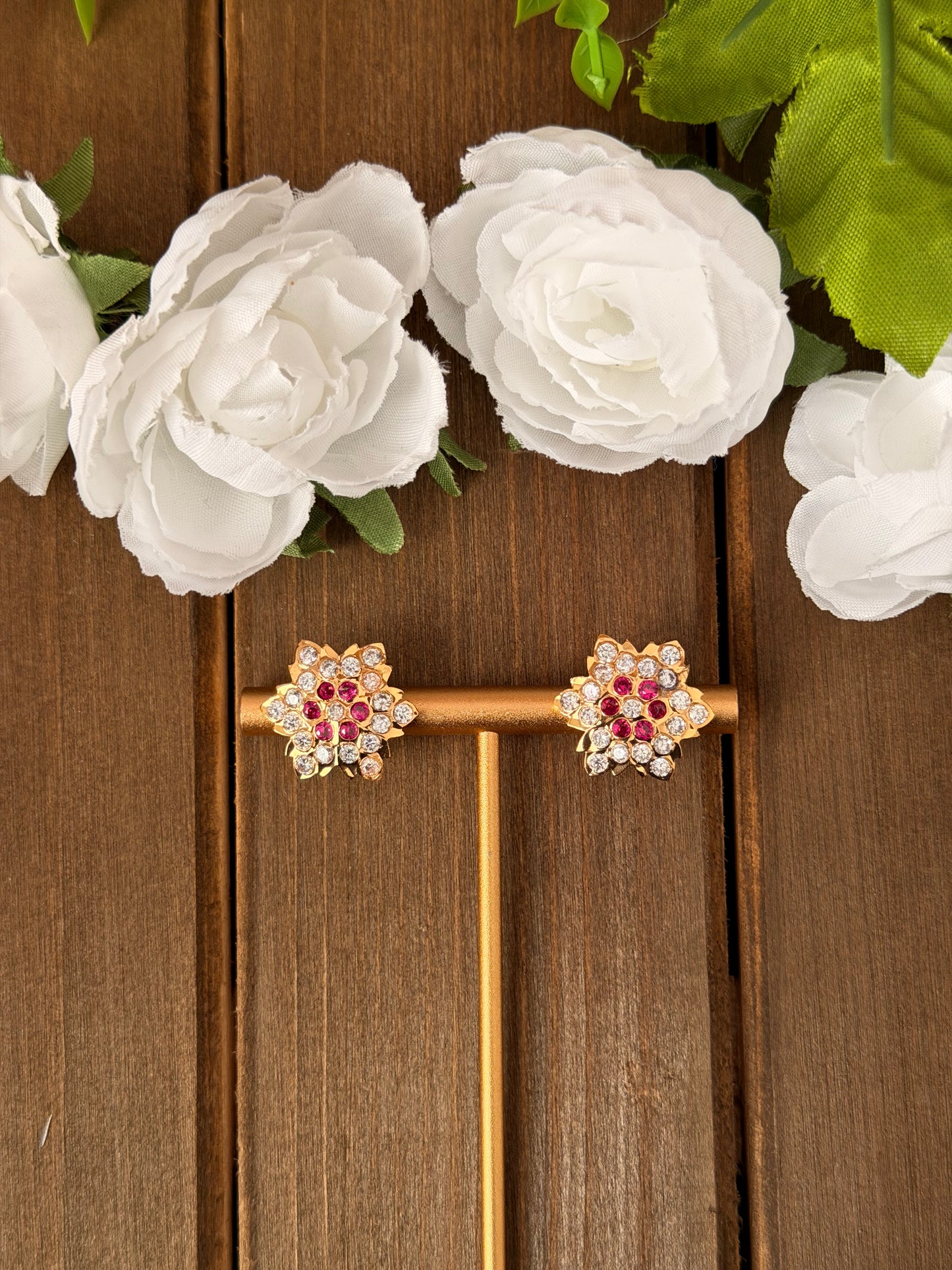 Impoun Stud Earrings