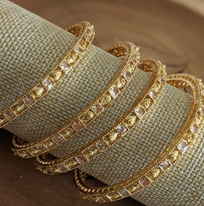 Polki deals gold bangles